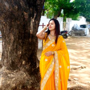 Elegant Yellow Silk Party Wear Saree With Attractive Stone Work
