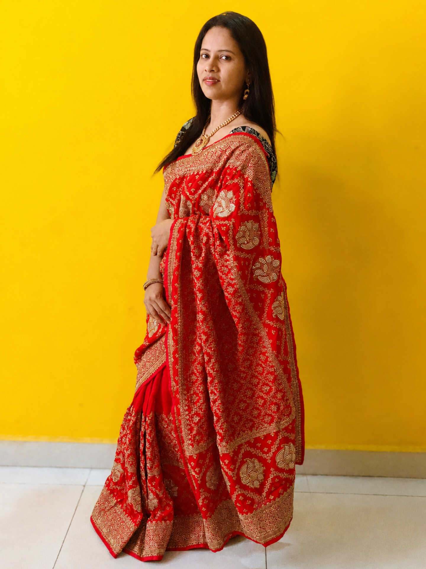 Elegant Red Designer Saree Featuring Heavy Gold Embroidery & Stone Embellishment