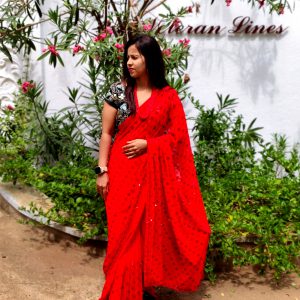 Red Georgette Party Wear Saree with Red & Black Heavy Stone Work