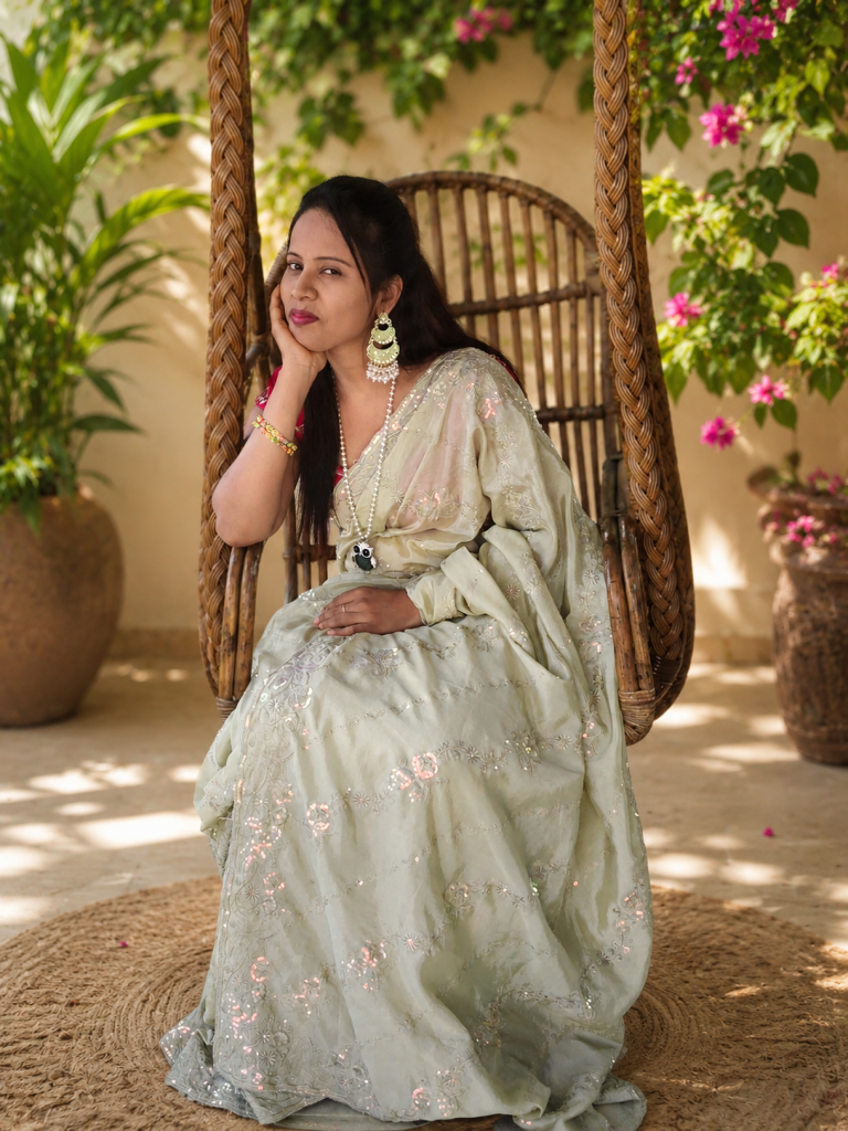 pista-green-soft-silk-saree-with-floral-thread-embroidery-stone-work